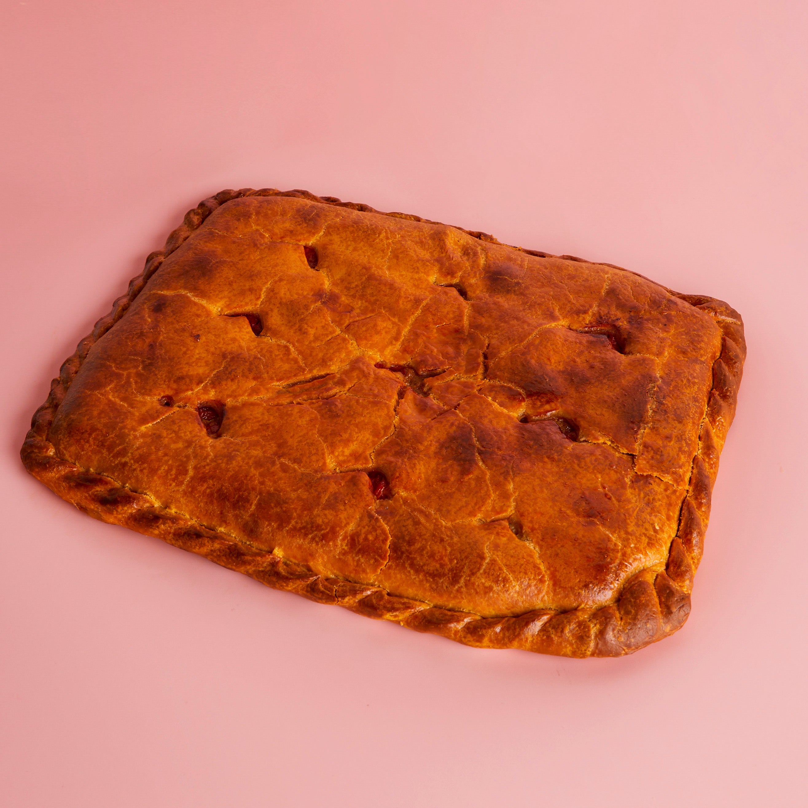 Empanada gallega de bonito, cebolla y pimiento asado